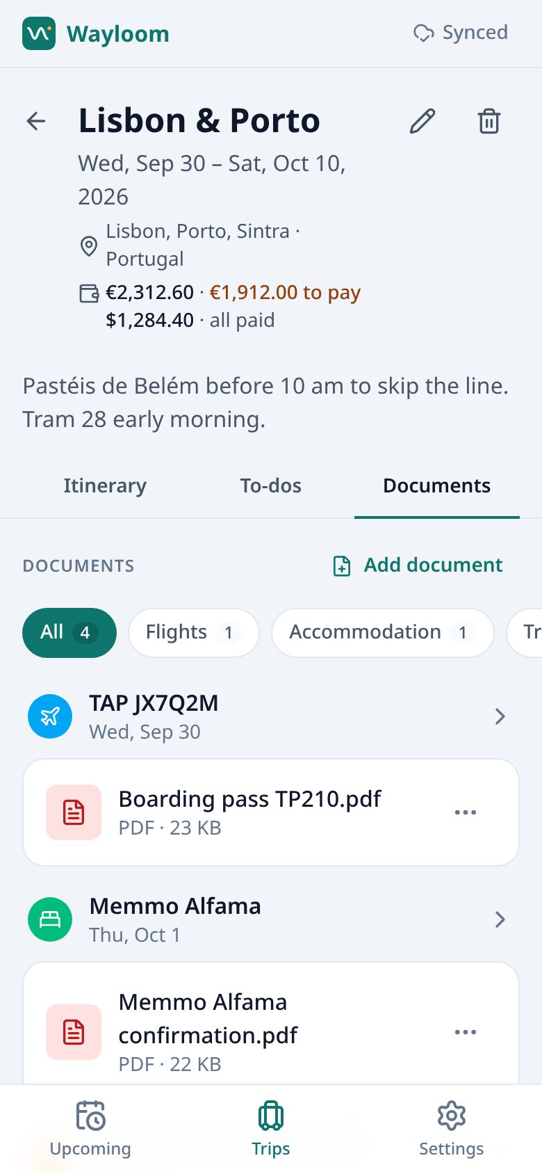 Documents tab: boarding pass PDF on the flight, hotel confirmation PDF on the stay